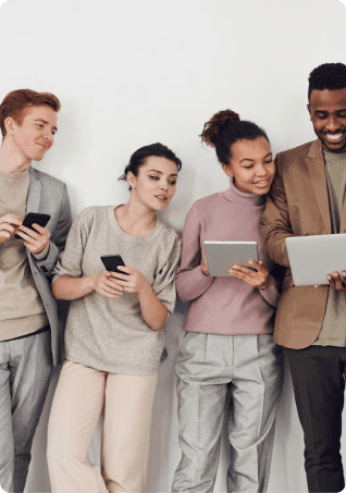 A four-person agency team standing together