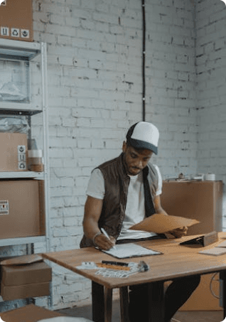 Store owner preparing products and content